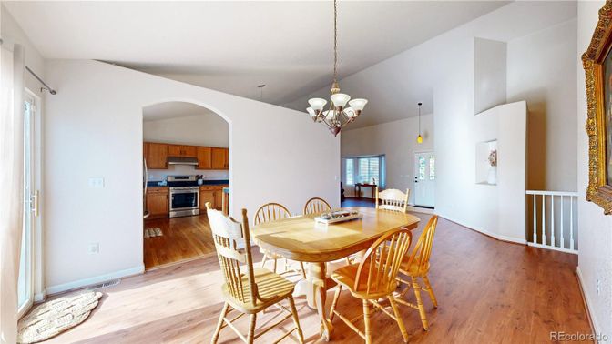 Chandelier, Dining room, Interior, Kitchen, Pendant Lights, Stainless Steel Appliances, Wood Texture Flooring