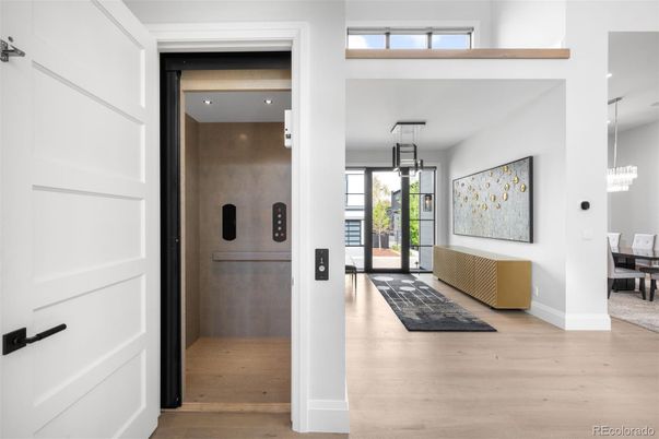 Elevator, Interior, Pendant Lights, Recessed Lighting, Wood Texture Flooring
