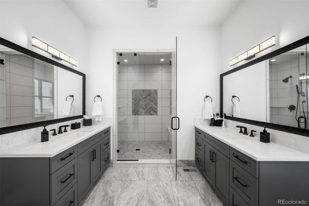 Bathroom, Dual Sink Vanities, Glass Shower, Interior, Marble, Recessed Lighting