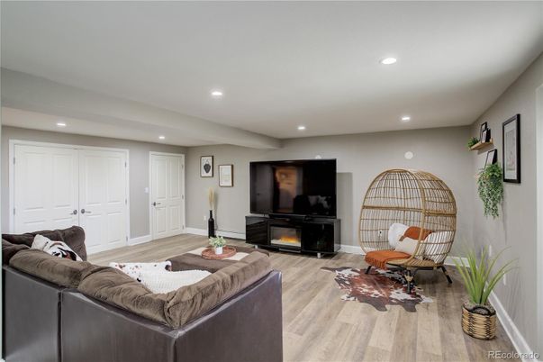 Fireplace, Interior, Living room, Recessed Lighting, Wood Texture Flooring