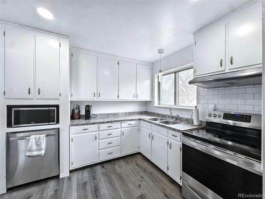 Interior, Kitchen, Pendant Lights, Recessed Lighting, Stainless Steel Appliances, Wood Texture Flooring
