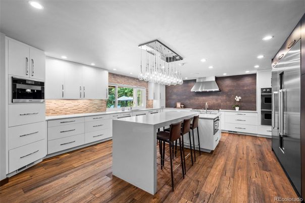 Interior, Kitchen, Pendant Lights, Recessed Lighting, Stainless Steel Appliances, Wood Texture Flooring