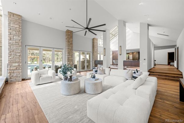 Fireplace, Interior, Living room, Pendant Lights, Recessed Lighting, Stone Walls, Wood Texture Flooring