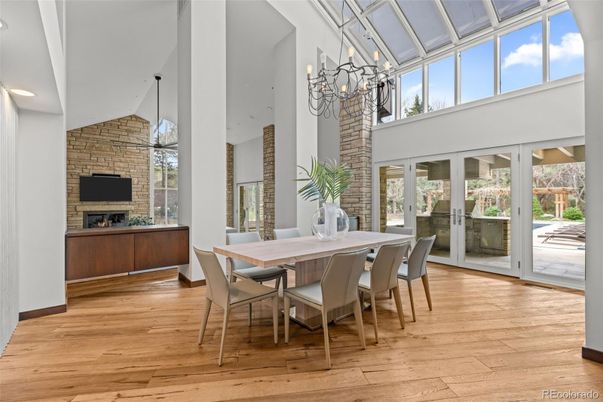 Chandelier, Dining room, Fireplace, Interior, Stone Walls, Wood Texture Flooring