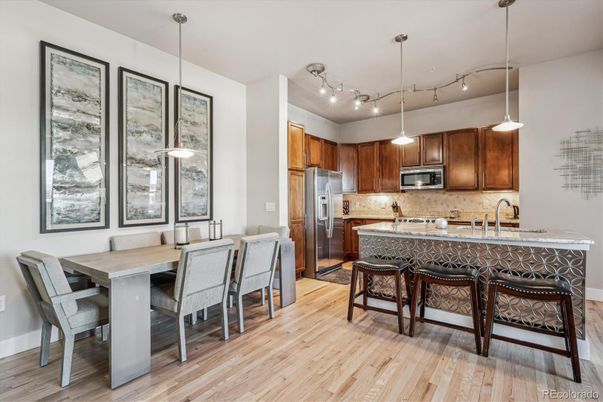 Dining room, Interior, Kitchen, Pendant Lights, Stainless Steel Appliances, Wood Texture Flooring