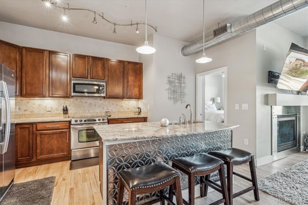 Fireplace, Interior, Kitchen, Pendant Lights, Stainless Steel Appliances, Wood Texture Flooring