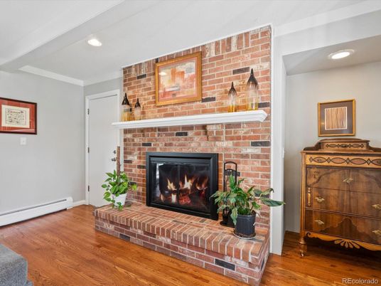 Fireplace, Interior, Recessed Lighting, Stone Walls, Wood Texture Flooring