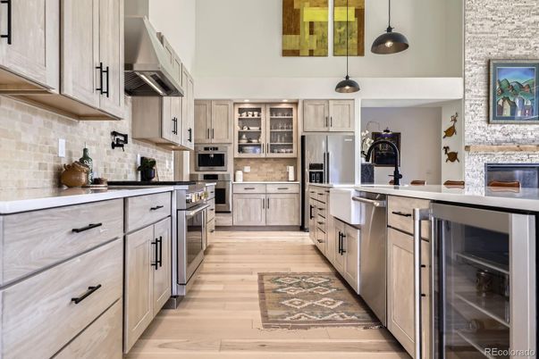 Fireplace, Interior, Kitchen, Pendant Lights, Stainless Steel Appliances, Wood Texture Flooring