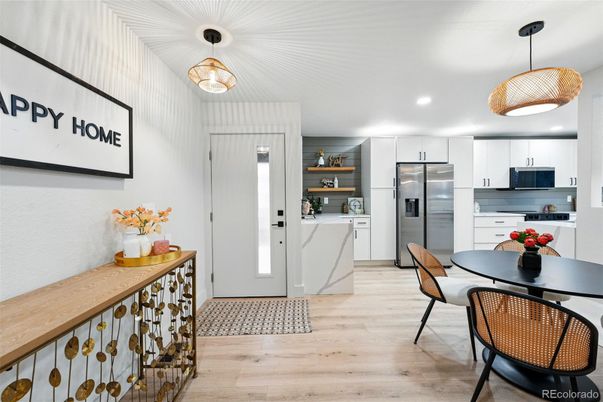 Dining room, Interior, Kitchen, Pendant Lights, Recessed Lighting, Stainless Steel Appliances, Wood Texture Flooring