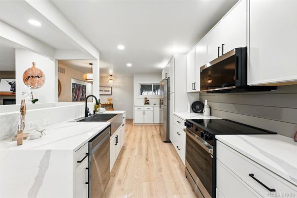 Interior, Kitchen, Pendant Lights, Recessed Lighting, Stainless Steel Appliances, Wood Texture Flooring