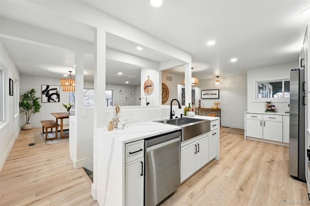 Dining room, Interior, Kitchen, Pendant Lights, Recessed Lighting, Stainless Steel Appliances, Wood Texture Flooring