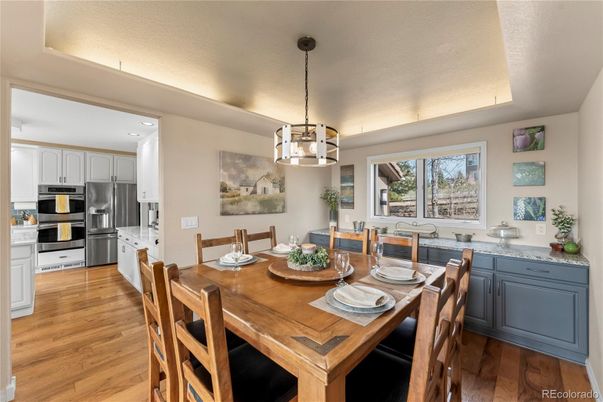 Dining room, Interior, Kitchen, Pendant Lights, Recessed Lighting, Stainless Steel Appliances, Wood Texture Flooring