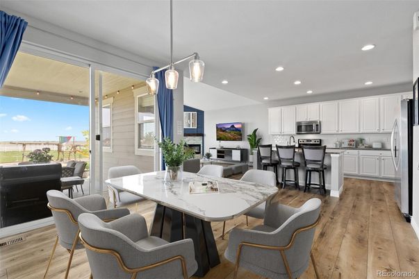 Dining room, Interior, Kitchen, Living room, Pendant Lights, Recessed Lighting, Stainless Steel Appliances, Wood Texture Flooring