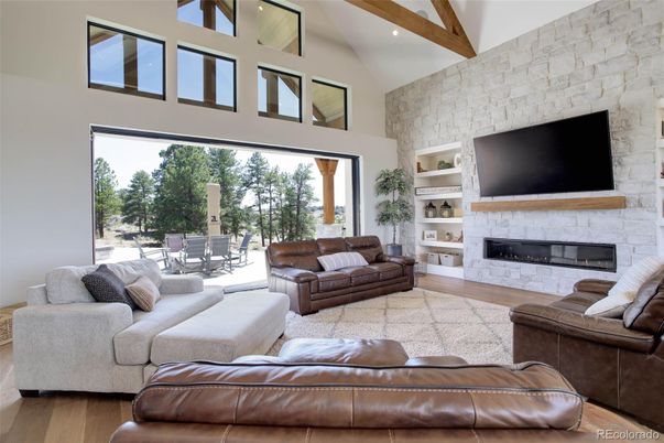 Fireplace, Interior, Living room, Recessed Lighting, Stone Walls, Wooden Beams, Wood Texture Flooring