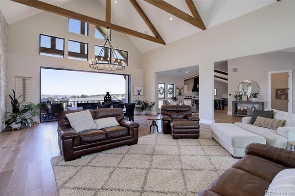 Chandelier, Dining room, Interior, Living room, Pendant Lights, Recessed Lighting, Wooden Beams, Wood Texture Flooring