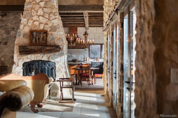 Chandelier, Dining room, Fireplace, Interior, Stone Walls, Wooden Beams