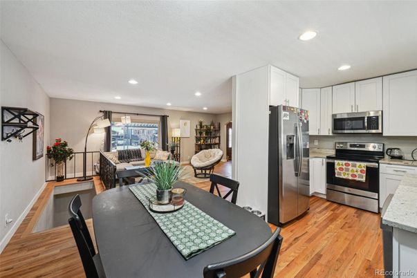 Dining room, Interior, Kitchen, Recessed Lighting, Stainless Steel Appliances, Wood Texture Flooring