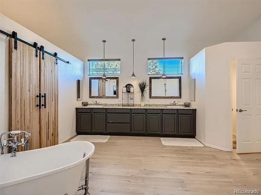 Bathroom, Dual Sink Vanities, Free Standing Baths, Interior, Pendant Lights, Wood Texture Flooring