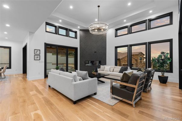 Chandelier, Fireplace, Interior, Living room, Pendant Lights, Recessed Lighting, Wood Texture Flooring