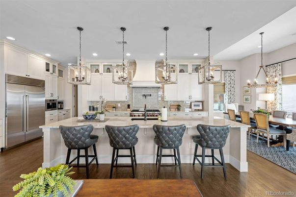 Chandelier, Dining room, Interior, Kitchen, Pendant Lights, Recessed Lighting, Stainless Steel Appliances, Wood Texture Flooring