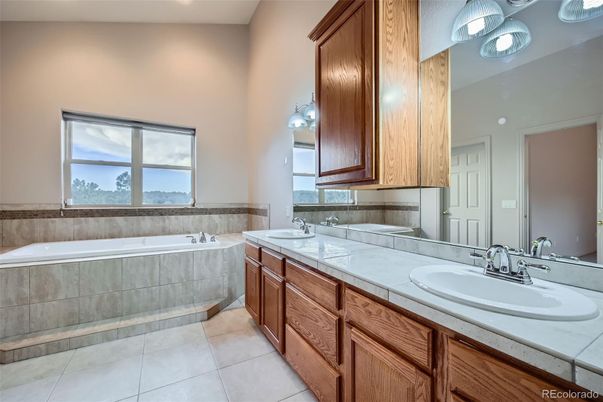 Bathroom, Dual Sink Vanities, Interior, Recessed Lighting, Tile Countertops
