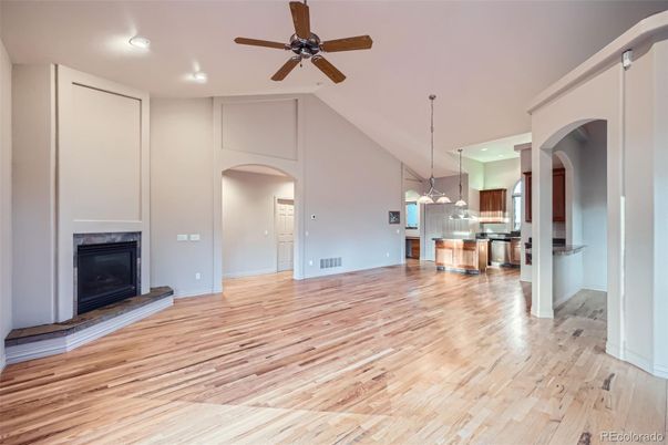 Empty room, Fireplace, Interior, Kitchen, Pendant Lights, Recessed Lighting, Wood Texture Flooring