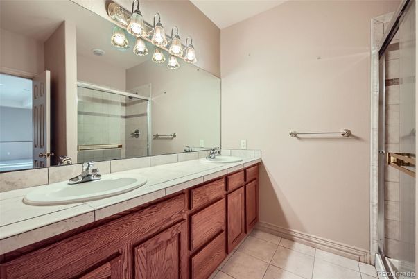 Bathroom, Dual Sink Vanities, Glass Shower, Interior, Tile Countertops