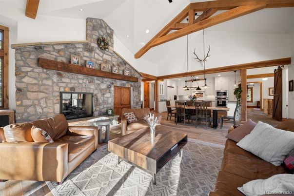 Dining room, Fireplace, Interior, Kitchen, Living room, Pendant Lights, Recessed Lighting, Stone Walls, Wooden Beams, Wood Texture Flooring