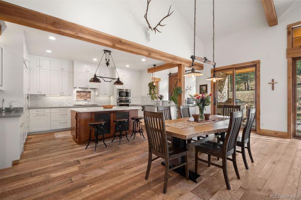 Dining room, Interior, Kitchen, Pendant Lights, Recessed Lighting, Stainless Steel Appliances, Wooden Beams, Wood Texture Flooring