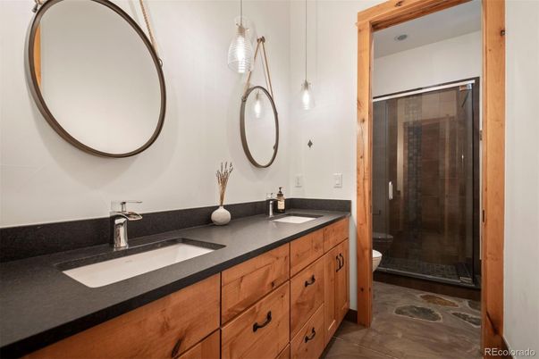 Bathroom, Dual Sink Vanities, Glass Shower, Interior, Pendant Lights