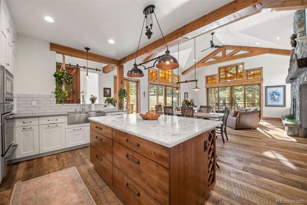 Dining room, Fireplace, Interior, Kitchen, Living room, Pendant Lights, Recessed Lighting, Wooden Beams, Wood Texture Flooring