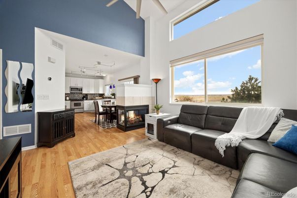 Dining room, Fireplace, Interior, Kitchen, Living room, Pendant Lights, Stainless Steel Appliances, Wood Texture Flooring