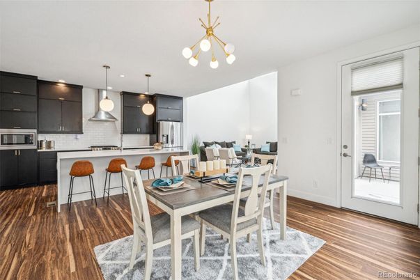 Dining room, Interior, Kitchen, Pendant Lights, Recessed Lighting, Stainless Steel Appliances, Wood Texture Flooring