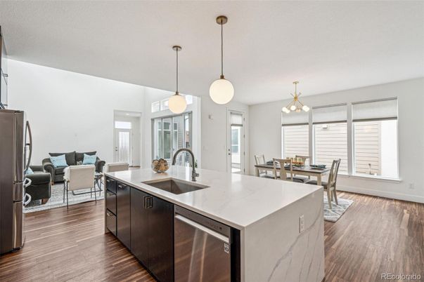 Dining room, Interior, Kitchen, Living room, Pendant Lights, Stainless Steel Appliances, Wood Texture Flooring