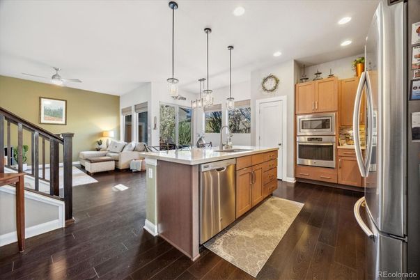 Dining room, Interior, Kitchen, Living room, Pendant Lights, Recessed Lighting, Stainless Steel Appliances, Wood Texture Flooring