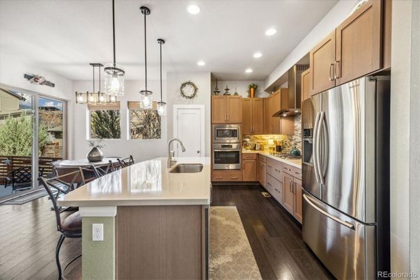 Interior, Kitchen, Pendant Lights, Recessed Lighting, Stainless Steel Appliances, Wood Texture Flooring