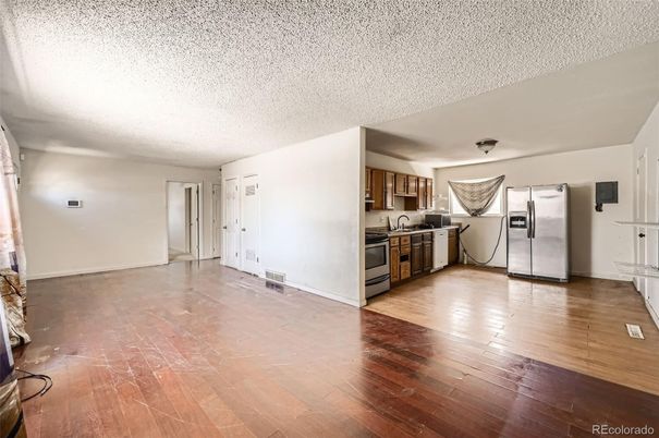 Empty room, Interior, Kitchen, Stainless Steel Appliances, Wood Texture Flooring