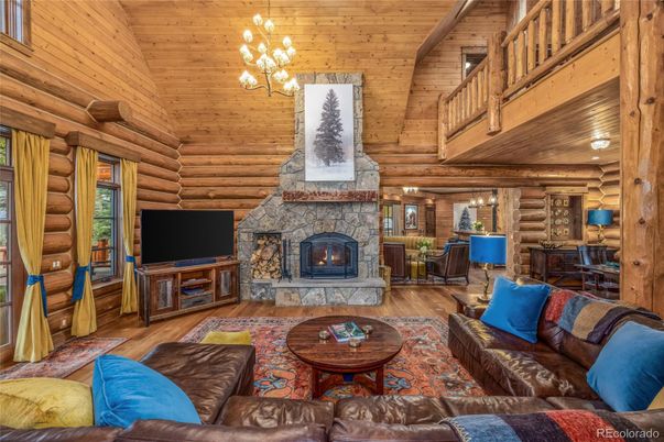 Chandelier, Dining room, Fireplace, Interior, Living room, Wooden Beams, Wooden Ceilings, Wood Texture Flooring, Wooden Walls