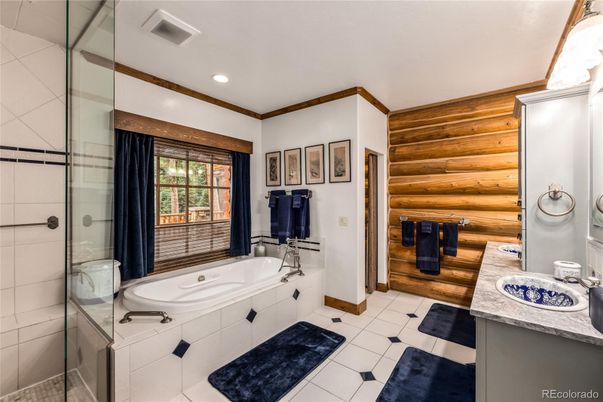 Bathroom, Dual Sink Vanities, Glass Shower, Interior, Recessed Lighting, Wooden Walls