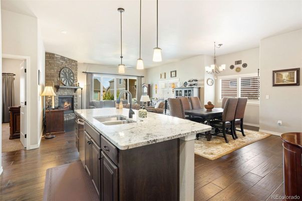 Chandelier, Dining room, Fireplace, Interior, Kitchen, Pendant Lights, Recessed Lighting, Wood Texture Flooring