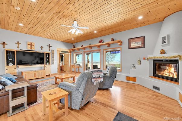 Fireplace, Interior, Living room, Recessed Lighting, Wooden Ceilings, Wood Texture Flooring