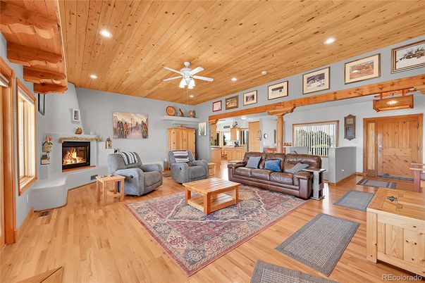 Fireplace, Interior, Living room, Recessed Lighting, Wooden Ceilings, Wood Texture Flooring