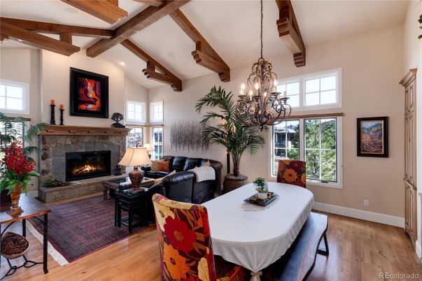 Chandelier, Dining room, Fireplace, Interior, Living room, Wooden Beams, Wood Texture Flooring