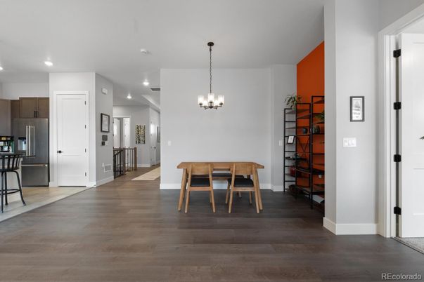 Chandelier, Dining room, Interior, Kitchen, Recessed Lighting, Stainless Steel Appliances, Wood Texture Flooring