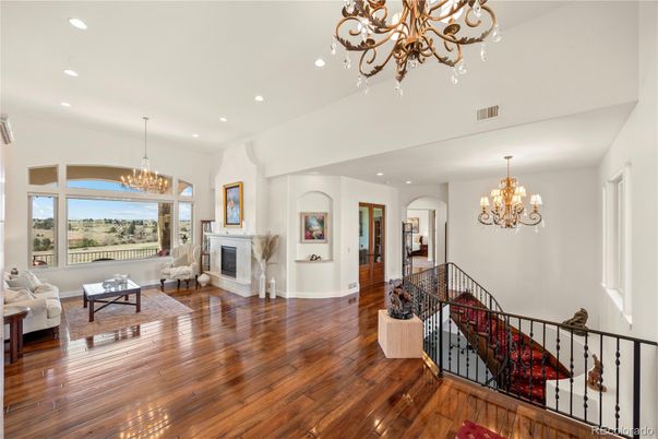 Chandelier, Fireplace, Interior, Living room, Recessed Lighting, Wood Texture Flooring