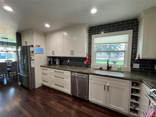 Dining room, Interior, Kitchen, Recessed Lighting, Stainless Steel Appliances, Wood Texture Flooring