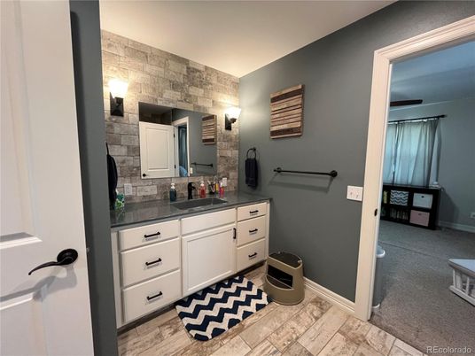 Bathroom, Dual Sink Vanities, Interior, Stone Walls, Wood Texture Flooring