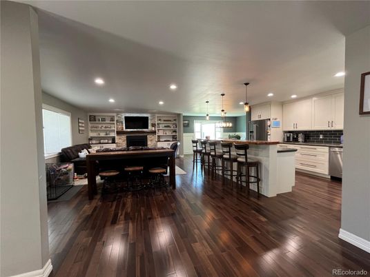 Dining room, Interior, Kitchen, Pendant Lights, Recessed Lighting, Stainless Steel Appliances, Wood Texture Flooring