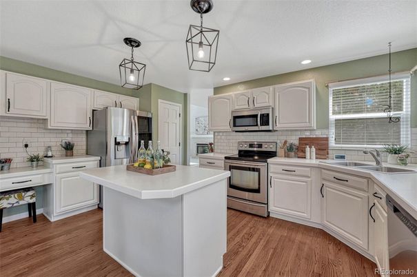 Interior, Kitchen, Pendant Lights, Recessed Lighting, Stainless Steel Appliances, Wood Texture Flooring