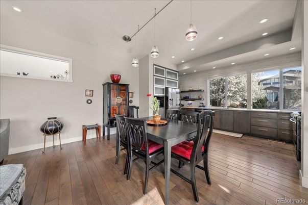 Dining room, Interior, Kitchen, Pendant Lights, Recessed Lighting, Stainless Steel Appliances, Wood Texture Flooring